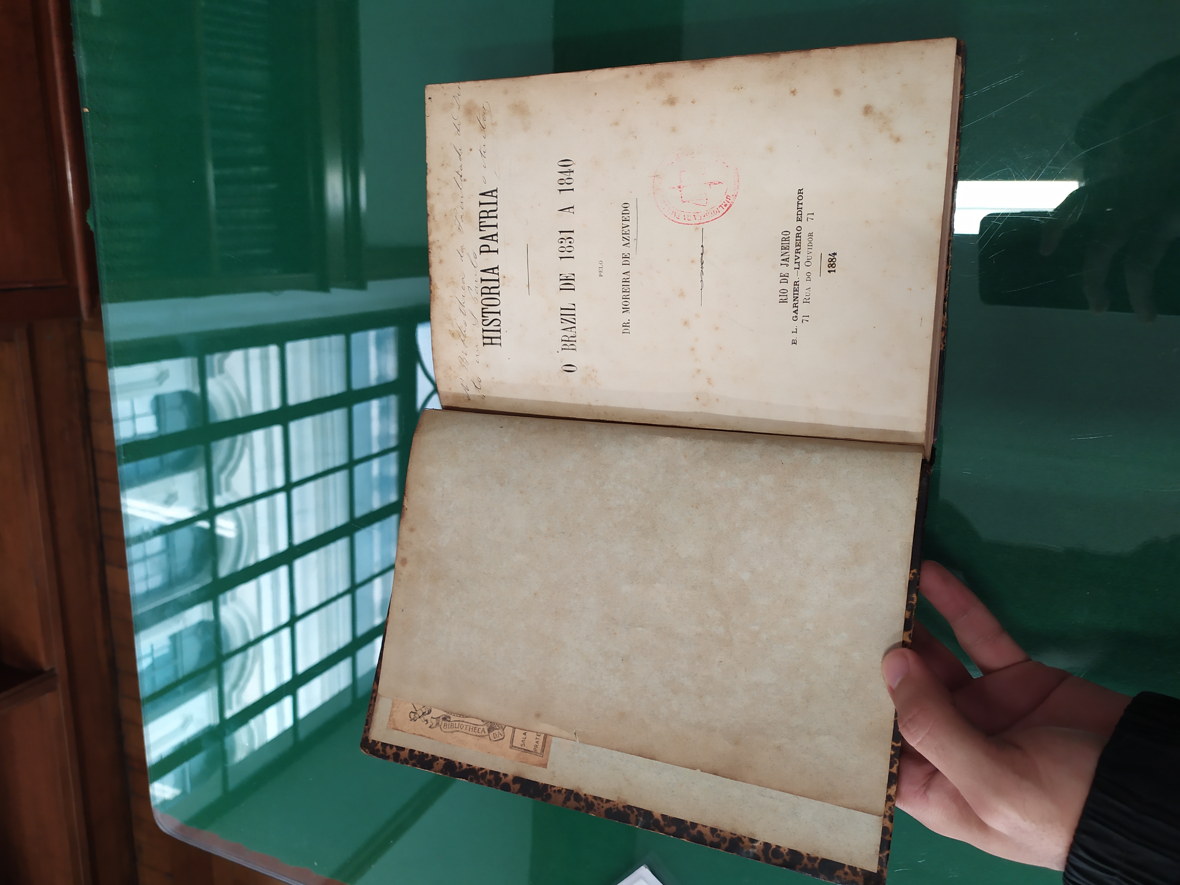 Antique open manuscript with detailed illustrations